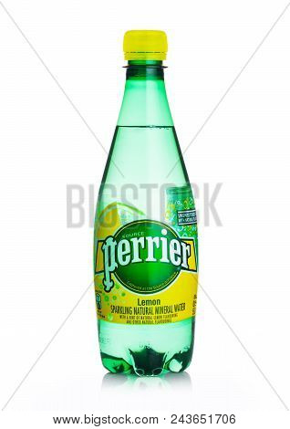 London, Uk - June 02, 2018: Plastic Bottle Of Perrier Sparkling Water With Lemon Flavour. Perrier Is
