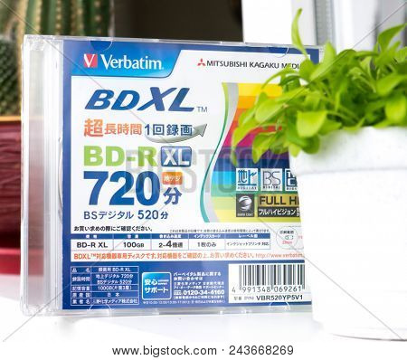 GOMEL, BELARUS - MAY 30, 2018: Mitsubishi (Verbatim) BD-R XL 100GB disc on a variocolor background. The Mitsubishi Group is a group of autonomous Japanese multinational companies.