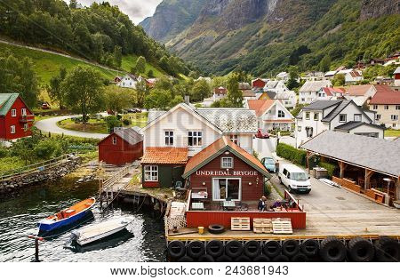 Undredal, Norway-august 16, 2014 -  Tourists And Local People At Undredal Village Port.