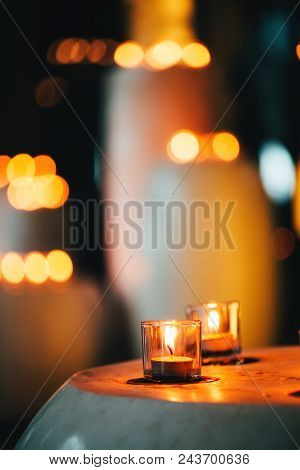 Candles In Spa Zone With Beautiful Relaxing Liight And Dlurry Colorful Backdrop.