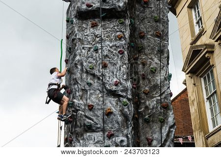 Bedford, Bedfordshire, Uk, June 2, 2018.young Boy Climbing Wall.