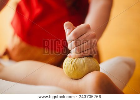 Beautiful Woman In The Spa Salon Doing Thai Massage. Concept Of Healthcare And Female Beauty. Masseu