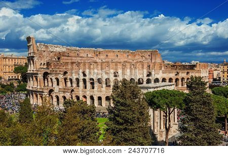 Coliseum And Arch Of Constantinus Ancient Ruins In Rome, Seen From The Nearby Palatine Hill