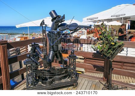 Zelenogradsk, Kaliningrad Region, Russia - July 29, 2017: Sculpture Of Iron Stray Dogs Musicians Whi