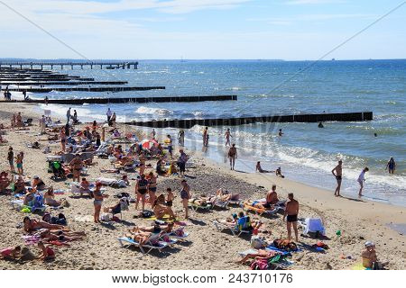 Zelenogradsk, Kaliningrad Region, Russia - July 29, 2017: Unknown People Resting On A Sandy Beach On