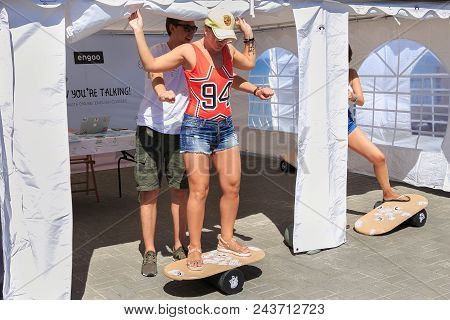 Zelenogradsk, Kaliningrad Region, Russia - July 29, 2017: Unknown Young Woman Learning To Balance On