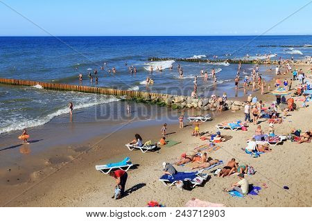 Zelenogradsk, Kaliningrad Region, Russia - July 29, 2017: Unknown People Resting On A Sandy Beach On