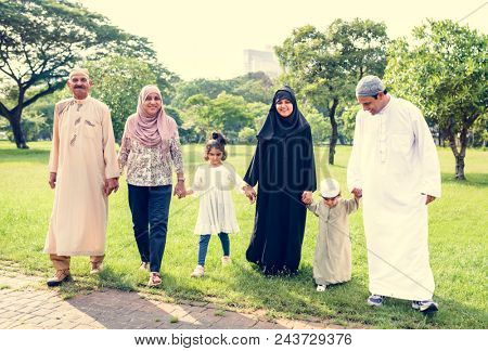 Muslim family having a good time outdoors