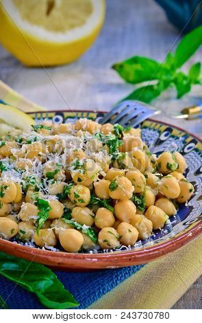 Chickpea Salad With Lemon, Parmesan Cheese And Fresh Herbs.