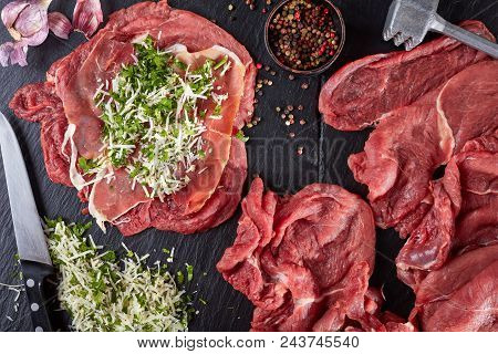 Raw Braciole - Pounded Beef Steaks Topped On With Prosciutto, Grated Parmesan Cheese And Finely Chop