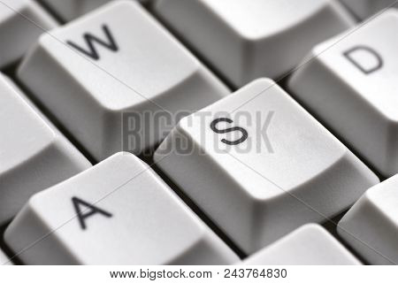Game Buttons A W S D On A White Keyboard Close-up For Gamer