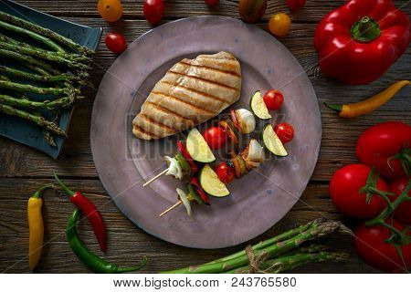 grilled chicken breast with brochette vegetable with grill asparagus
