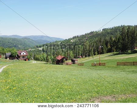 Fabulous Landscapes Of Grassy Field And Forest At Beskid Mountains Range In European Salmopol Pass A