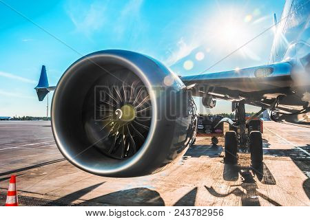 Aircraft Is Parked At The Airport Before Departure, The View On The Wing Of The Chassis Rack Gear En