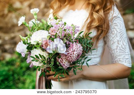 Trendy Wedding Bouquet In Bride's Hands