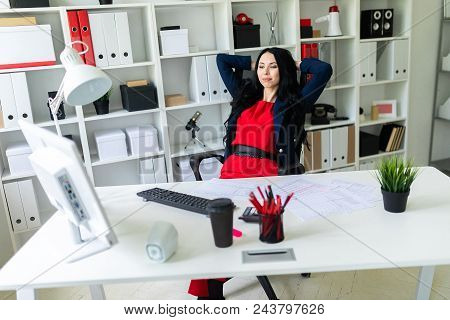Portrait Of A Young Girl In A Suit. Beautiful Girl Is Working In The Office.