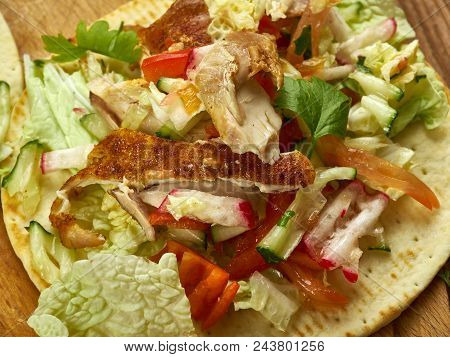 Loaded Chicken Tostadas, Topped With Cheese, Tomatoes, Guacamole, Olives And Jalapenos Are A Great W