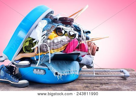 Blue Overloaded Trunk Different Things Accessories Clothes Towels Passport Bikini Tickets Coat Hange