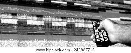 Man With Large Tv Remote Trying To Fix The Digital Television Noise On A Large Plasma Oled 4k Ultra 