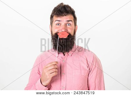Cheerful Bearded Man At Birthday Celebration, Party Mood Concept. Brutal Man With Long Beard Holding