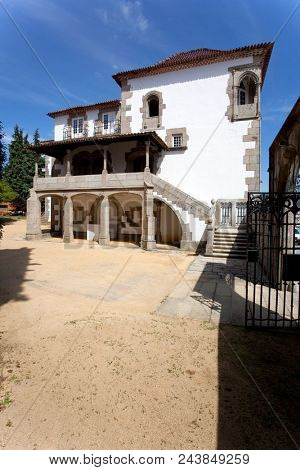 Braga, Portugal - July 27, 2015: The Coimbras House entrance. Historical medieval architecture in Manuelino style, the Portuguese Gothic.