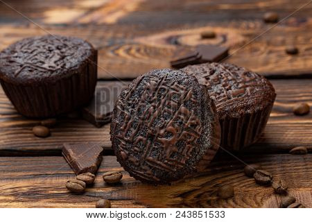 Chocolate Muffins On A Broun Rustic Wooden Table - Selective Focus. Brackfast