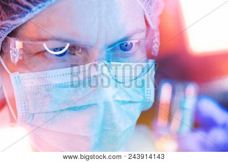 Medical Science Researcher Performing Scientific Test In Laboratory, Female Bioengineer Working On D