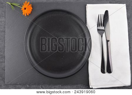 Colorful And Crisp Image Of Common Marigold And Table Setting On Slate