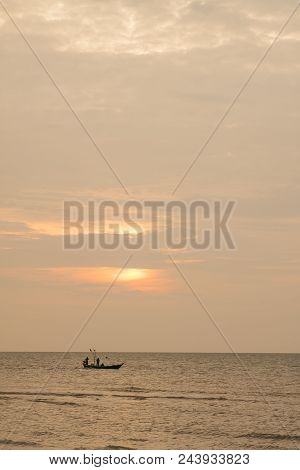 A Boat In The Sea During The Sunset Time In Thailand