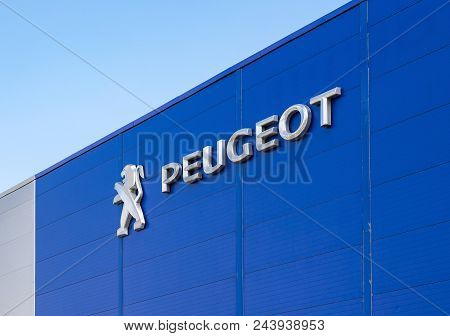 Samara, Russia - May 19, 2018: Peugeot Dealership Logo On The Office Of Official Dealer. Peugeot Is 