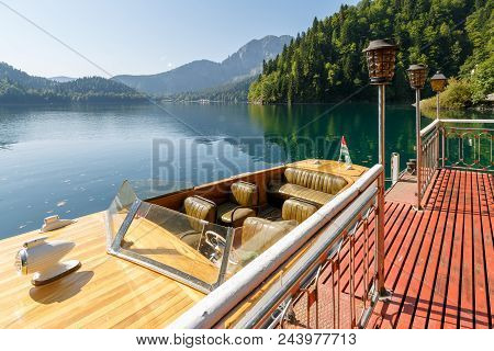 Abkhazia, Georgia, 17 September 2017: Beautiful Vintage Speed Boat Is Moor At The Pier On Lake Ritsa
