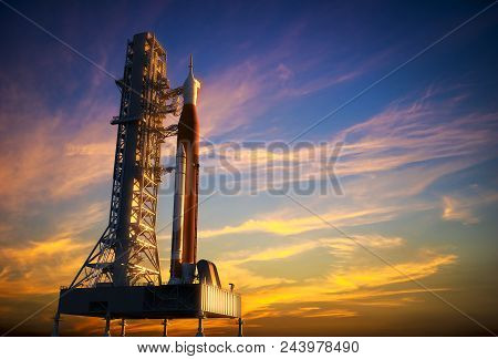 Space Launch System On Launchpad Over Background Of Red Clouds. 3d Illustration.