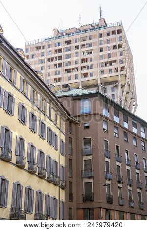 Milan (lombardy, Italy): The Famous Building Known As Torre Velasca With Other Palaces