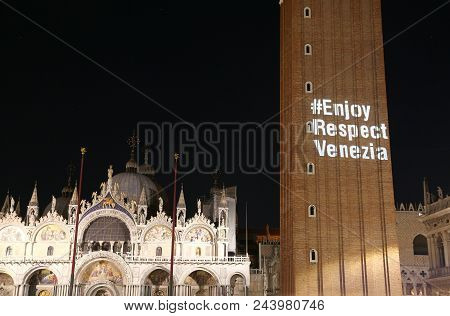 Venice, Ve, Italy - September 8, 2017: Basilica Of San Marco And The Big Text On The Big Bell Tower 