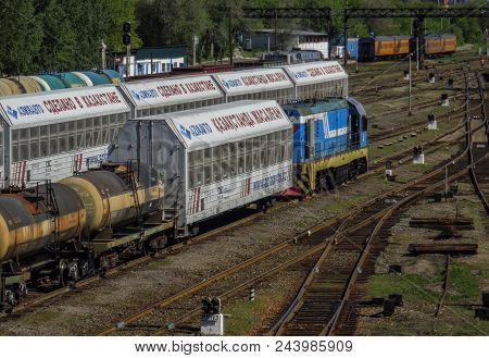 Kazakhstan, Ust-kamenogorsk, June 1, 2018: Shunting Locomotive With Wagons At The Railway Station. F