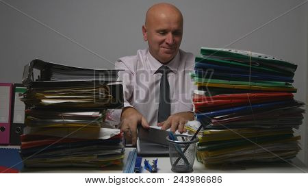 Happy Businessman Image Working In Financial Archive Room With Documents