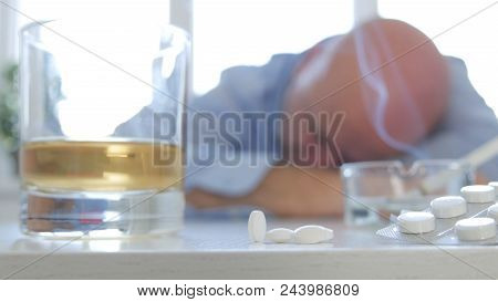 Tired Man Sleeping After Consume Drugs And Alcohol