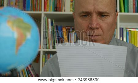 Businessman Image In Office Room Reading Financial Documents