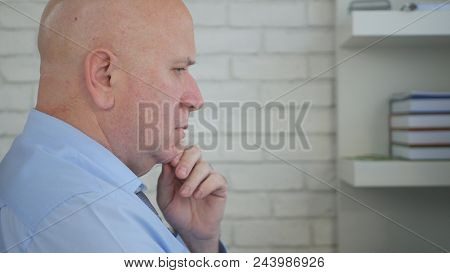 Upset Businessman Thinking Pensive and Troubled Inside Office Room