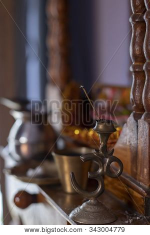 Incense Stick Stand In Front Of Throne Or Sinhasan Of God; Incense Stick Is Finished On The Om Stand