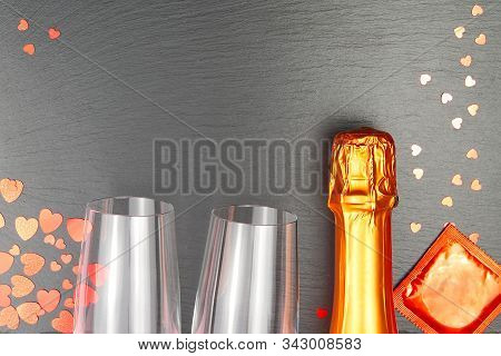 Two Glasses Of White Champagne On Black Background. Festive Romantic Concept. St. Valentines Day And