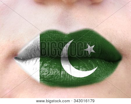 Female Lips Close Up With A Picture Flag Of Pakistan. Learning Languages.