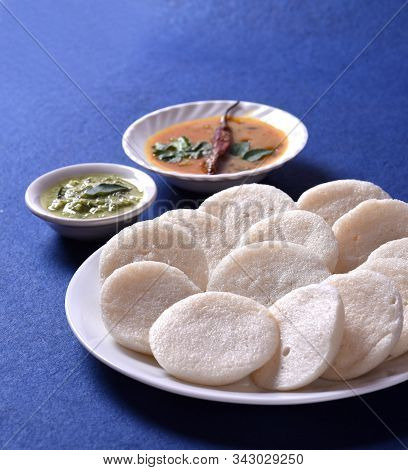 Idli With Sambar And Coconut Chutney On Blue Background, Indian Dish : South Indian Favourite Food R