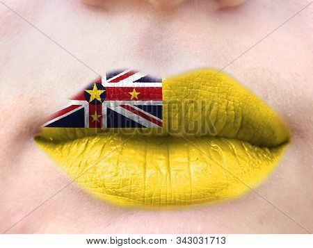 Female Lips Close Up With A Picture Flag Of Niue. Learning Languages.