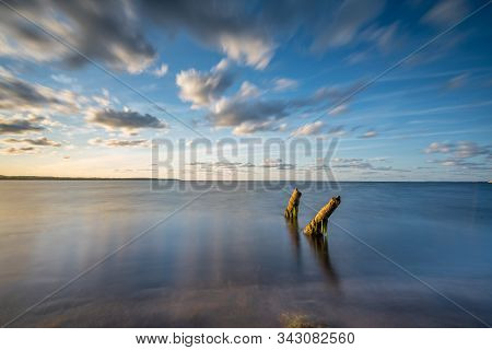 Old Wooden Piles On The Beach.baltic Sea, Rewa, Poland