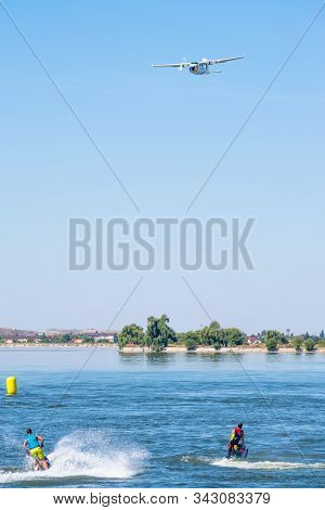 Bucharest/ Romania - Aeronautic Show - September 21, 2019: Tecnam P2006T Airplane Flying In The Sky