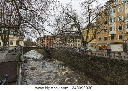 Gorgeous View On  Street Near River On Background. Gorgeous Sky With Thunderclouds On A Winter Day. 