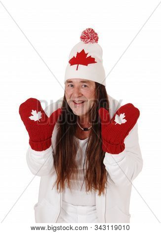 A Happy Indigenous Man Dressed In White With A Hat And Mittens
With The Canadian Mabel Leaf, Isolate