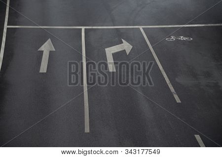 Traffic Signal,road Signs Arrows On Asphalted Surface,road Sings Of Straight, Right Turn Arrows And 