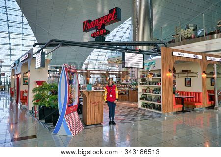 DUBAI, UAE - CIRCA JANUARY 2019: entrance to Tranzeet DXB in Dubai International Airport.